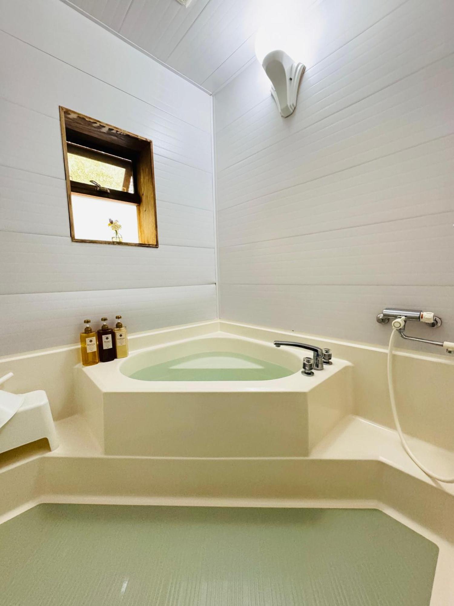 Yufuin Log House No Yado Tom Sawyer Hotell Eksteriør bilde